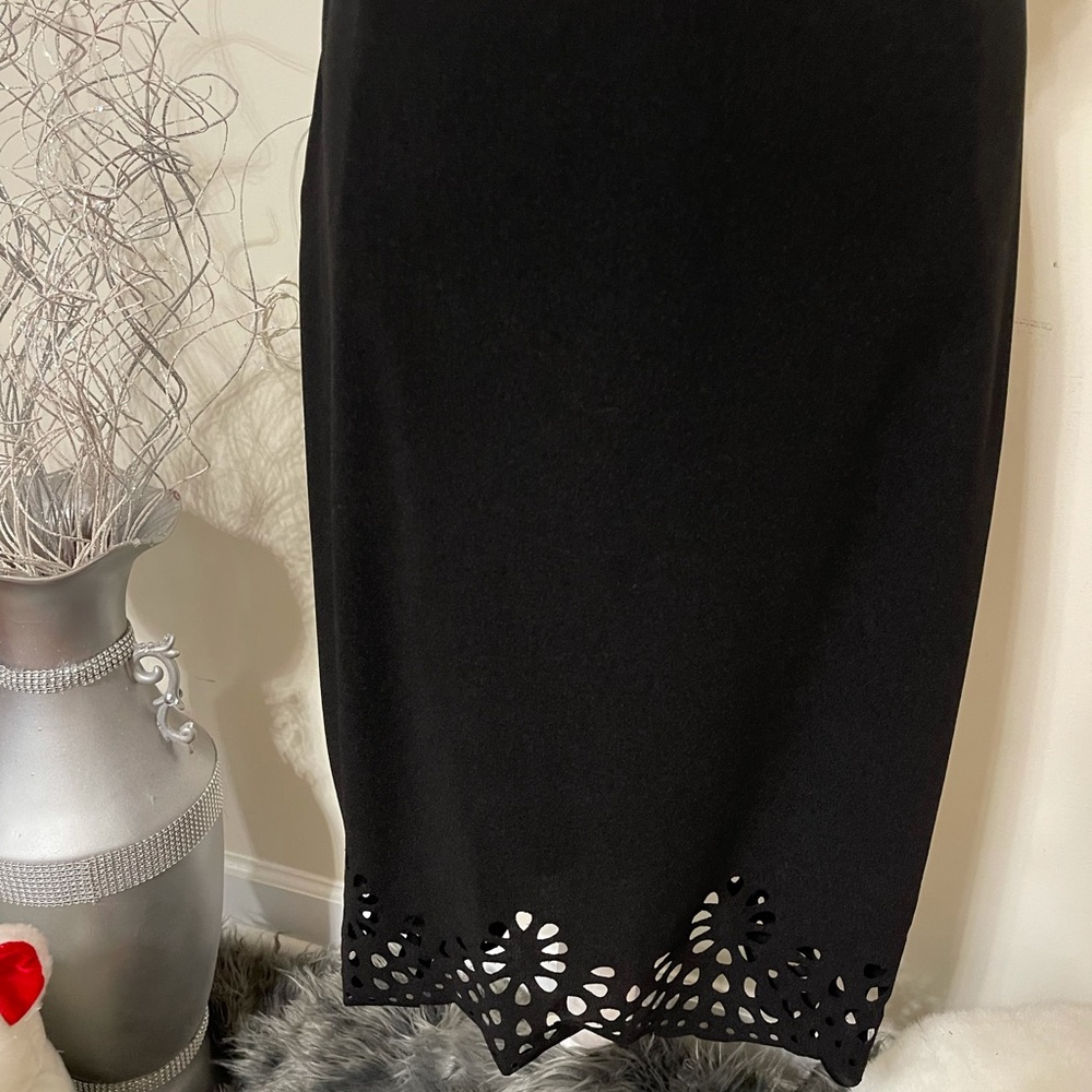 Black skirt with Cut-Out Details around the bottom
